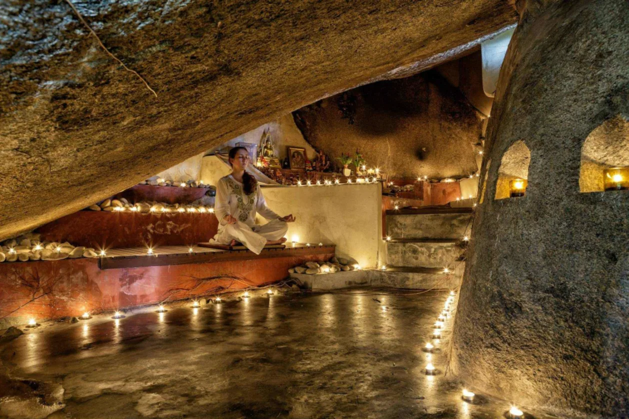 Kamalaya Koh Samui healing retreat woman in monk's cave